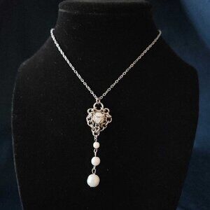 Gothic white pearl rosary necklace with a small silver chain